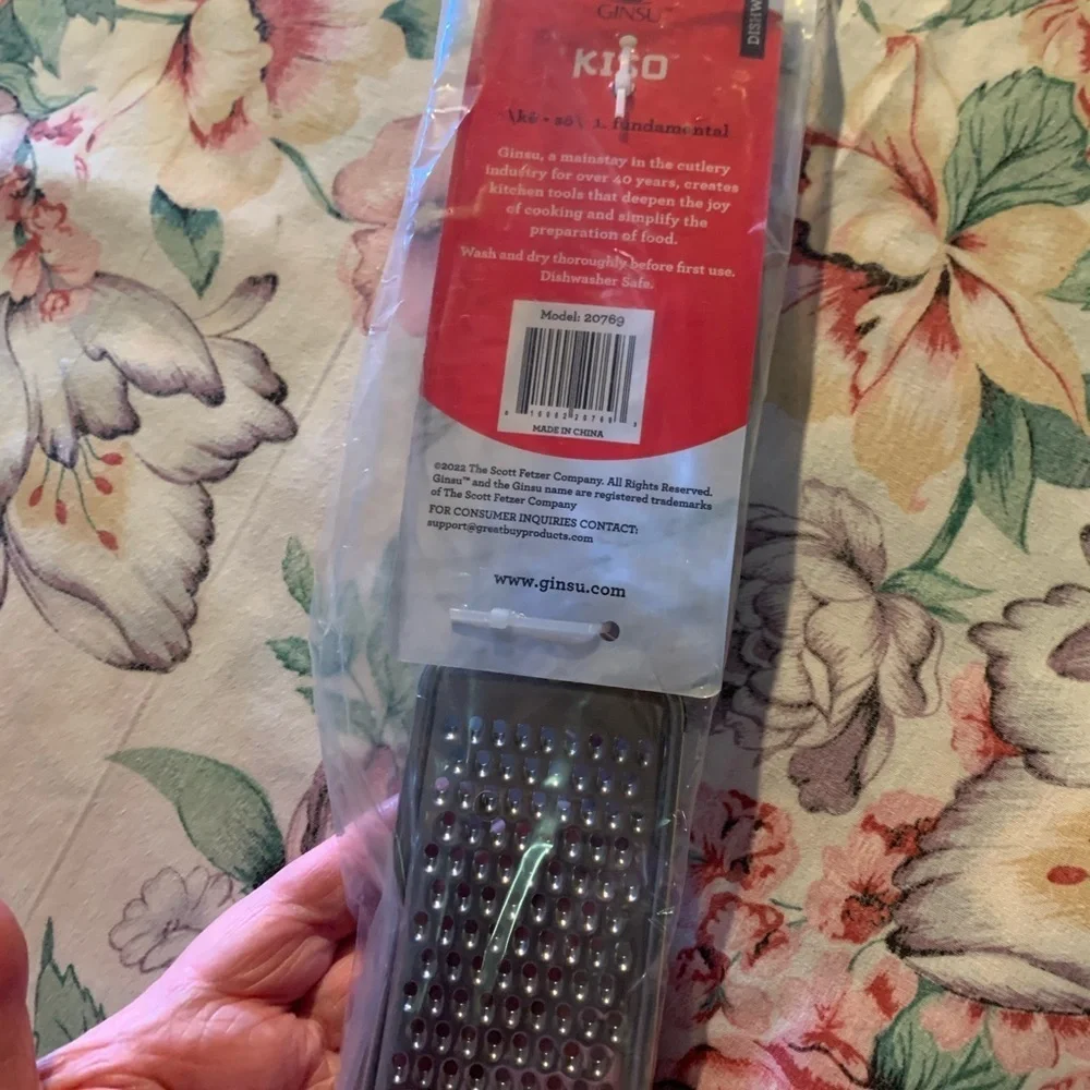 Silver Stainless Steel Cheese Grater with Black Ergonomic Handle